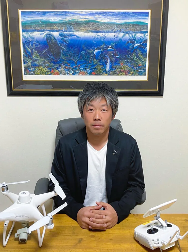 代表 田村佳章の顔写真